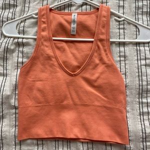 Aurora seamless crop rib tank top. MORE SALMON COLORED IN PERSON
